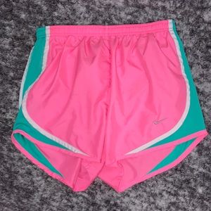 Nike athletic shorts, colors pink and mint green, woman’s size small